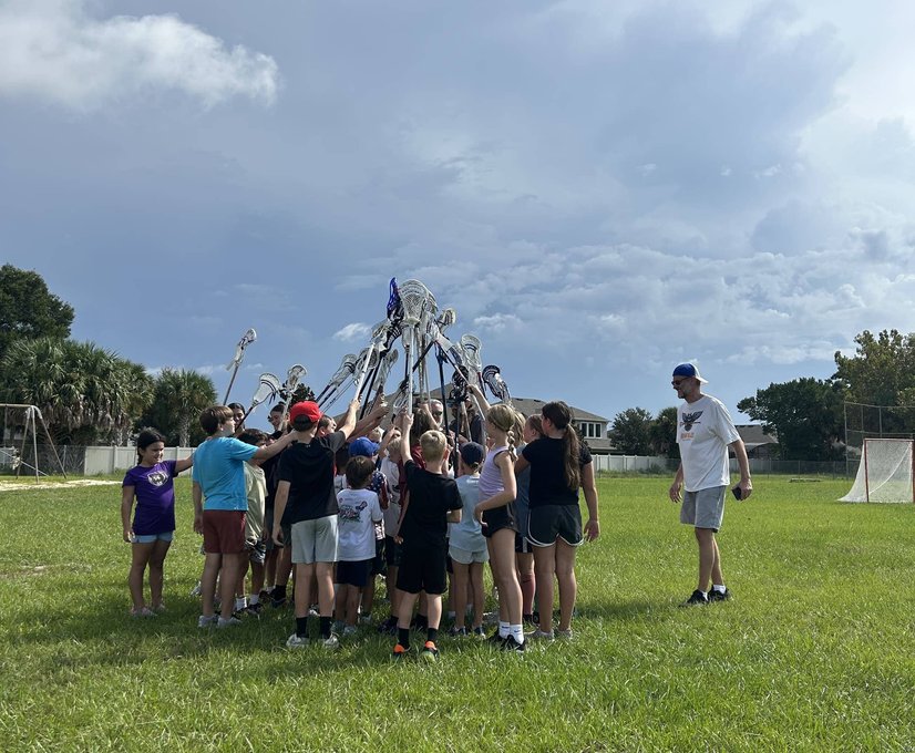 Athletes competing for possession on field